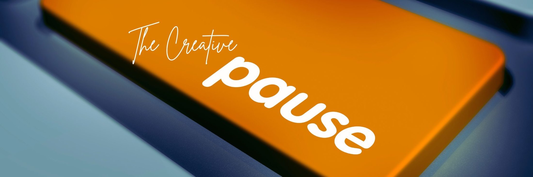 A photograph of a keyboard with the words "The Creative Pause" highlighting the importance of creative fine art photography