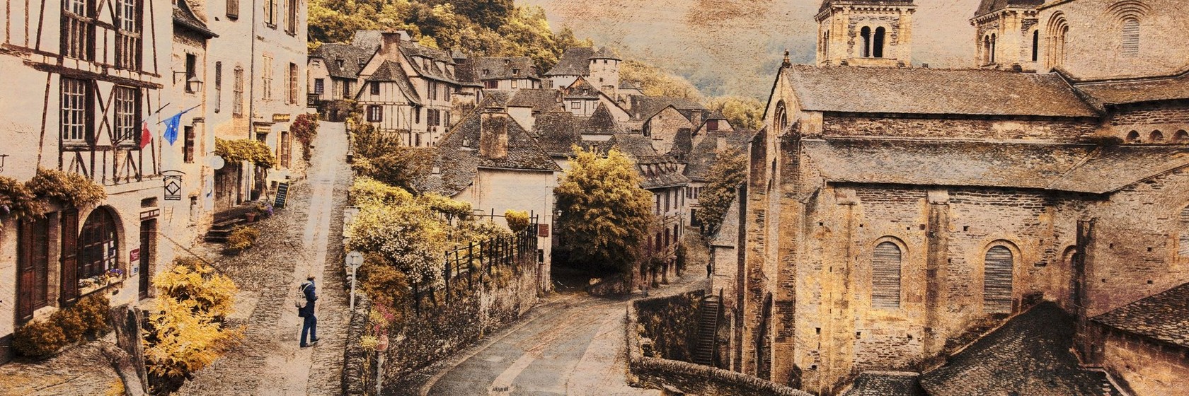 Medieval French village street and stone church, a Photo Alchemy image by Martin Osner