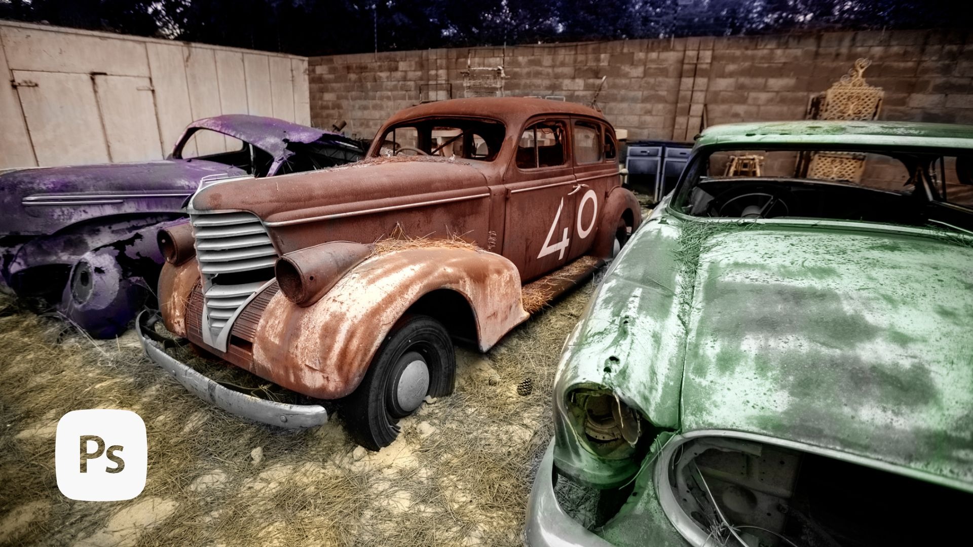Three weathered vintage cars – purple, rusty orange with "40" marking, and mint green – abandoned against concrete walls.