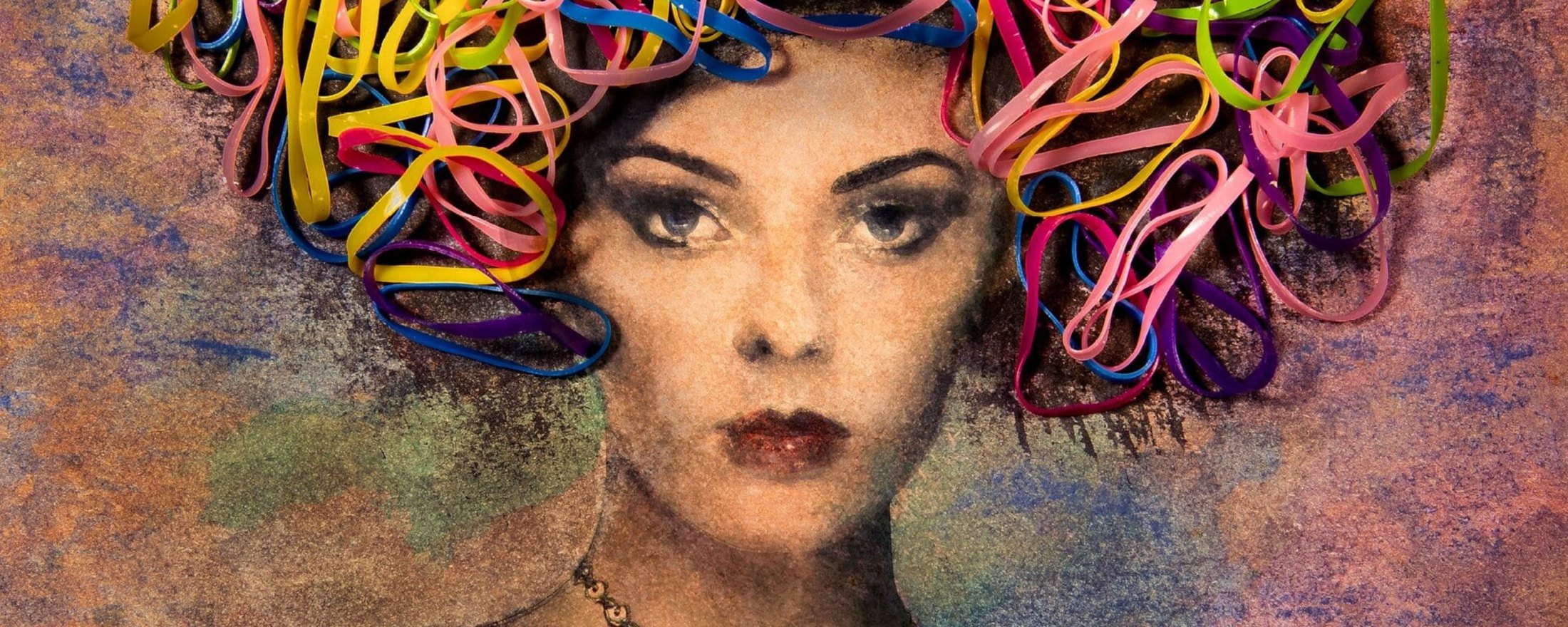 "Fine art photographic portrait of a woman with vibrant, abstract colourful ribbons as hair, mixed media art photography